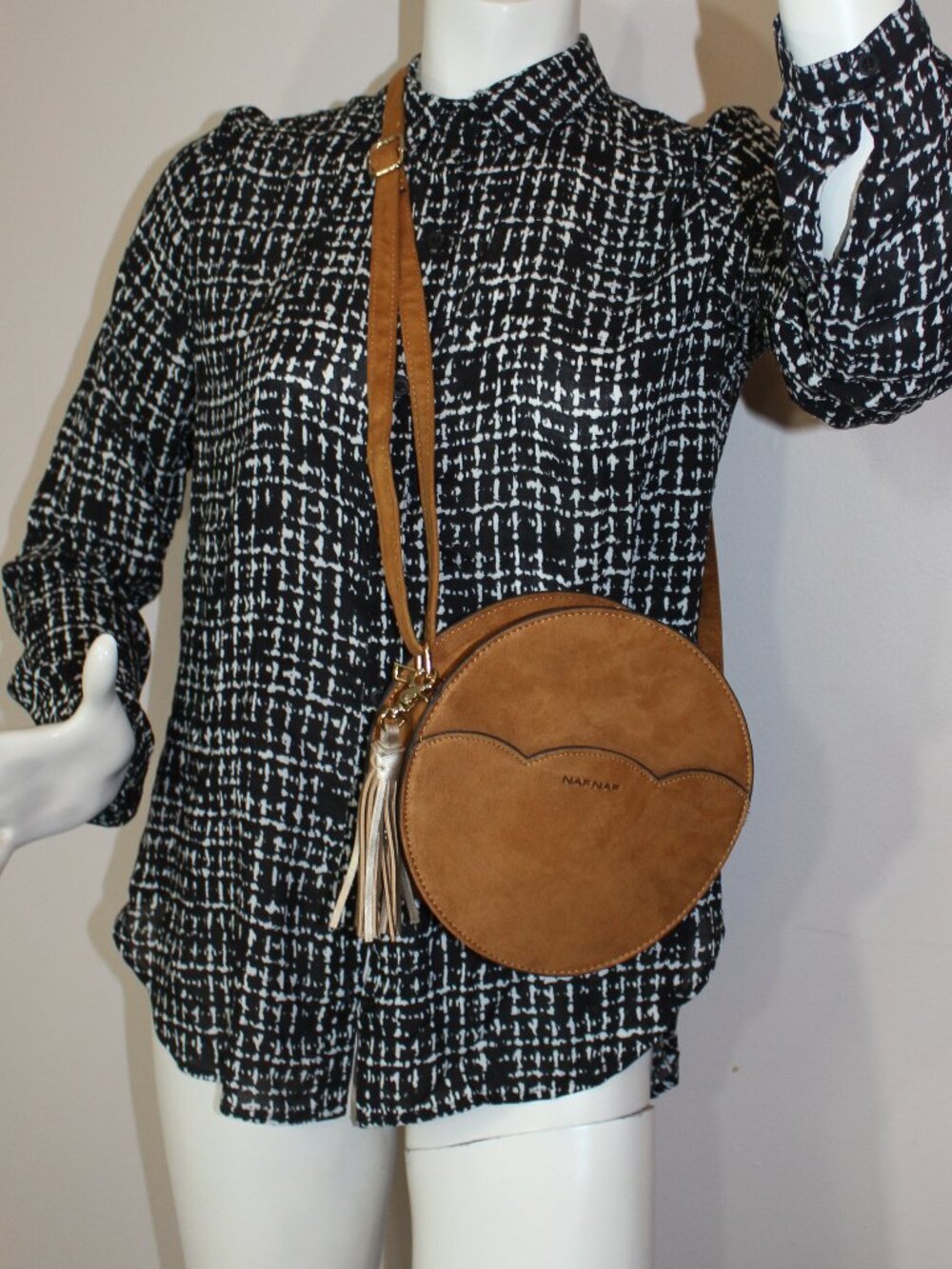 NAF NAF Camel Shoulder round polyester sipped woman bag 8" x2.5" w